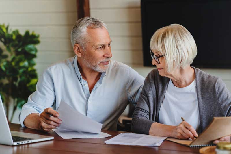 Estate Planning, a couple making a decision on paperwork